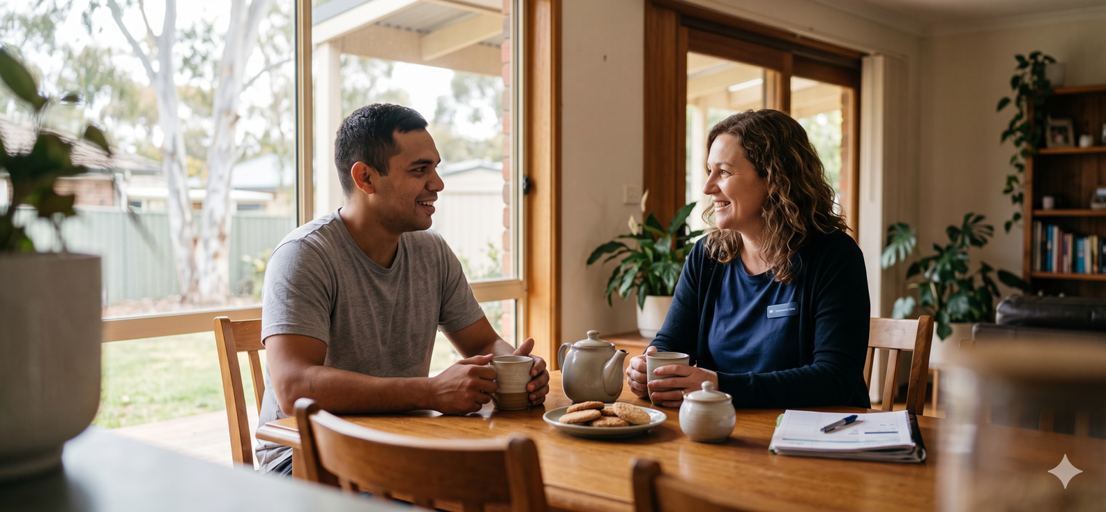 NDIS Provider Gatton 1 Support worker and participant meeting at home to talk through support