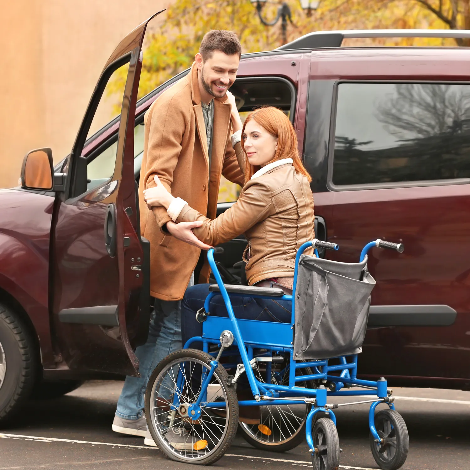 NDIS Provider Coomera 3 Support worker helping a participant in a wheelchair into a van
